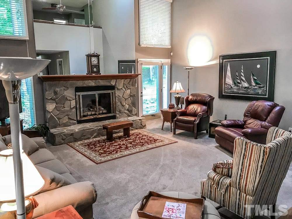 6407 Craig Road Durham, NC 27712 - Photo 9 of 25 20 x 16 with Gas Log Fireplace and Stone surround. Lots of room to entertain or relax.