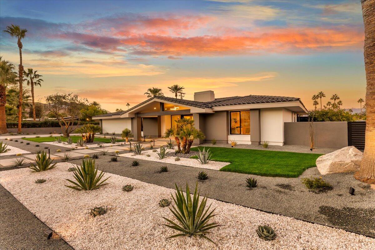 73306 Juniper Street Palm Desert, CA 92260 - Photo 2 of 79 02-Front of Home at Twilight