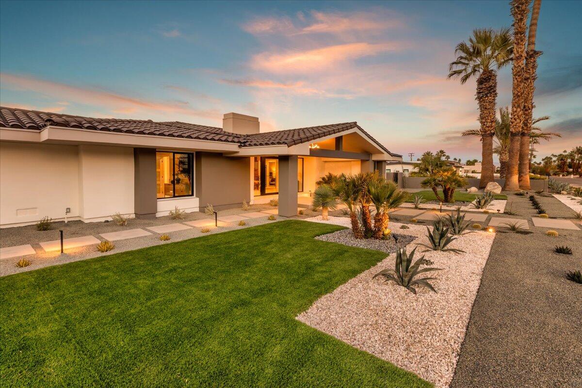 73306 Juniper Street Palm Desert, CA 92260 - Photo 68 of 79 72-Front of Home at Twilight