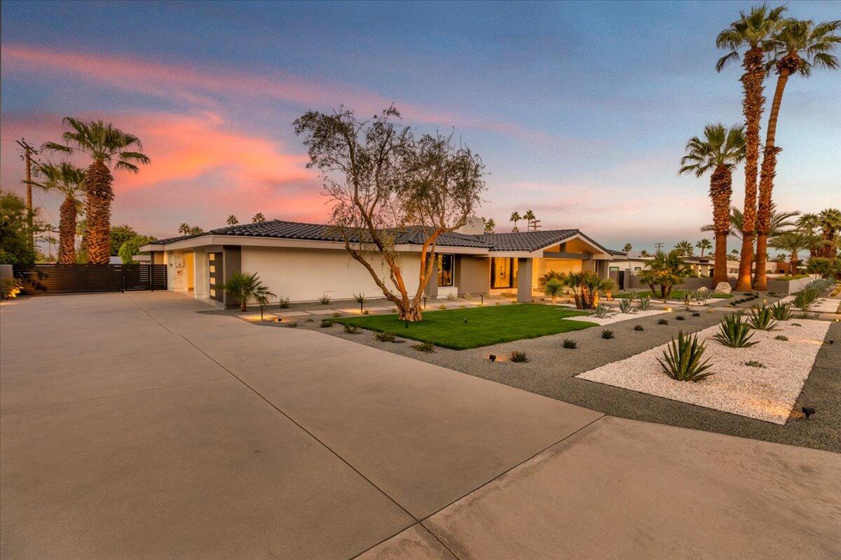 73306 Juniper Street Palm Desert, CA 92260 - Photo 69 of 79 73-Front of Home at Twilight