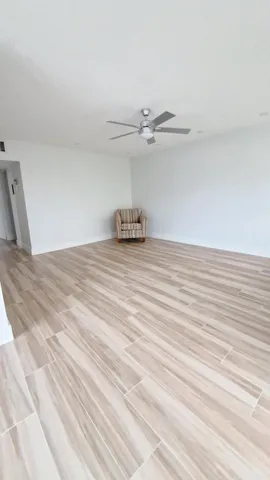 a view of a livingroom with a flat screen tv