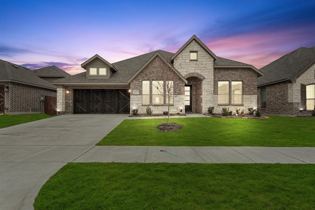 217 Resting Pl Road Waxahachie, TX 75165 - Photo 1 of 1 a front view of a house with a yard