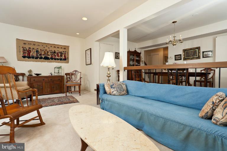 6617 Weymouth Road Baltimore, MD 21212 - Photo 13 of 30 a living room with furniture and wooden floor
