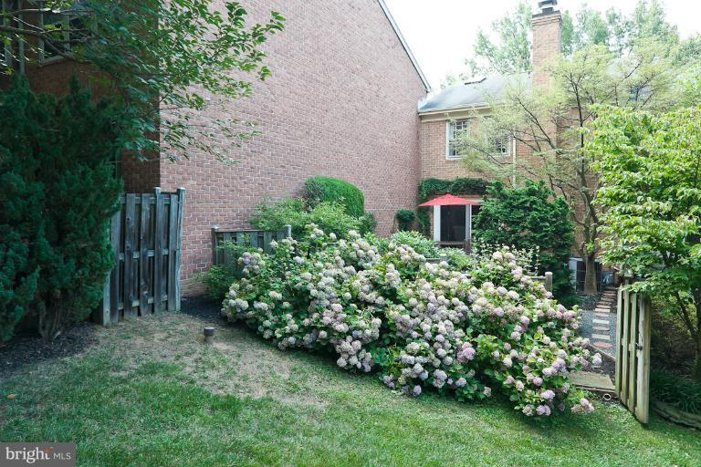 6617 Weymouth Road Baltimore, MD 21212 - Photo 20 of 30 a view of a house with a garden