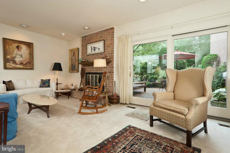 6617 Weymouth Road Baltimore, MD 21212 - Photo 2 of 30 a living room with furniture and a fireplace