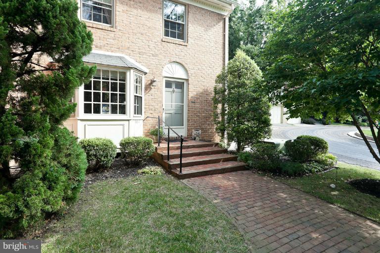 6617 Weymouth Road Baltimore, MD 21212 - Photo 30 of 30 a front view of a house with a garden