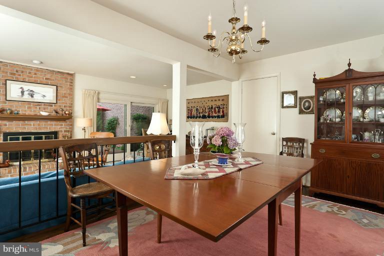 6617 Weymouth Road Baltimore, MD 21212 - Photo 3 of 30 a view of a dining room with furniture and a chandelier