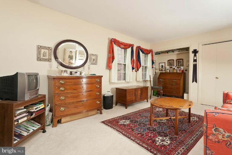 6617 Weymouth Road Baltimore, MD 21212 - Photo 5 of 30 a living room with furniture and a dresser