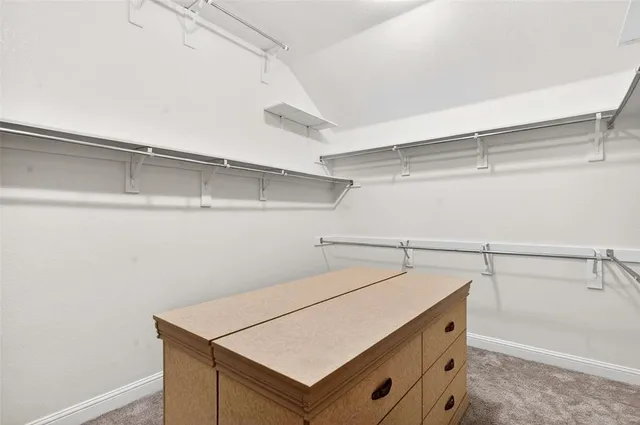a utility room with cabinets