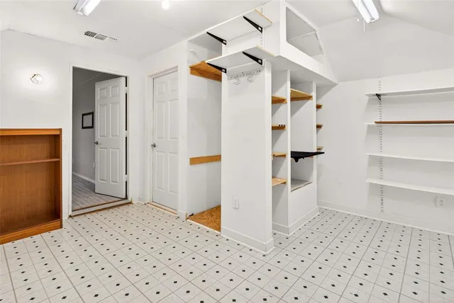 a bathroom with a sink and a shower