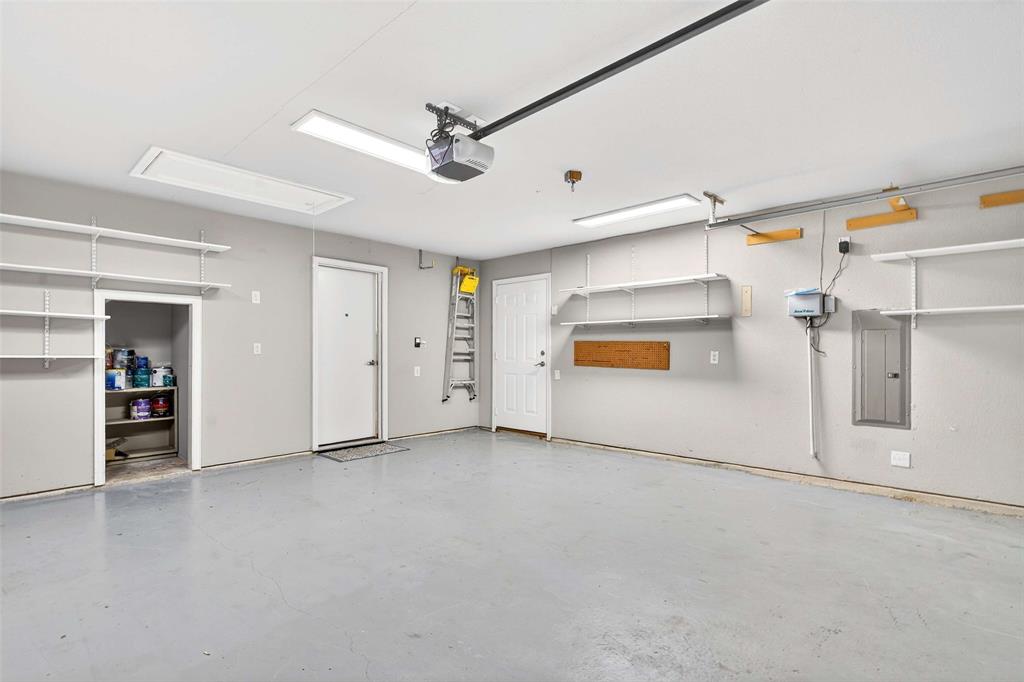 704 Scenic Ranch Circle Fairview, TX 75069 - Photo 32 of 40 an empty room with ceiling fan and windows