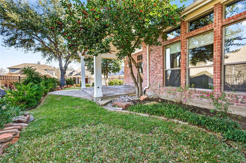 704 Scenic Ranch Circle Fairview, TX 75069 - Photo 35 of 40 a view of a house with backyard and sitting area