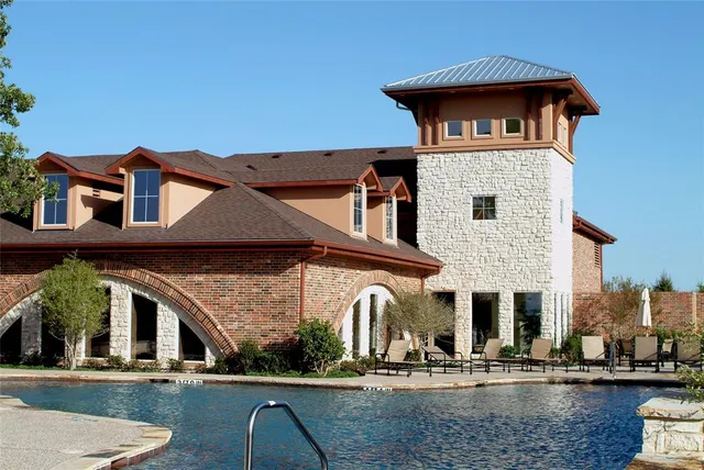 a front view of residential houses with street