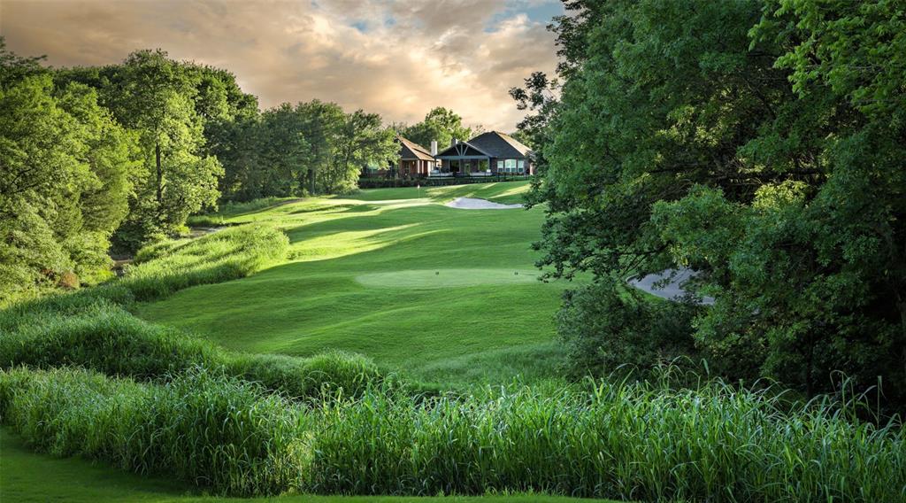 704 Scenic Ranch Circle Fairview, TX 75069 - Photo 40 of 40 a view of a golf course with a lake