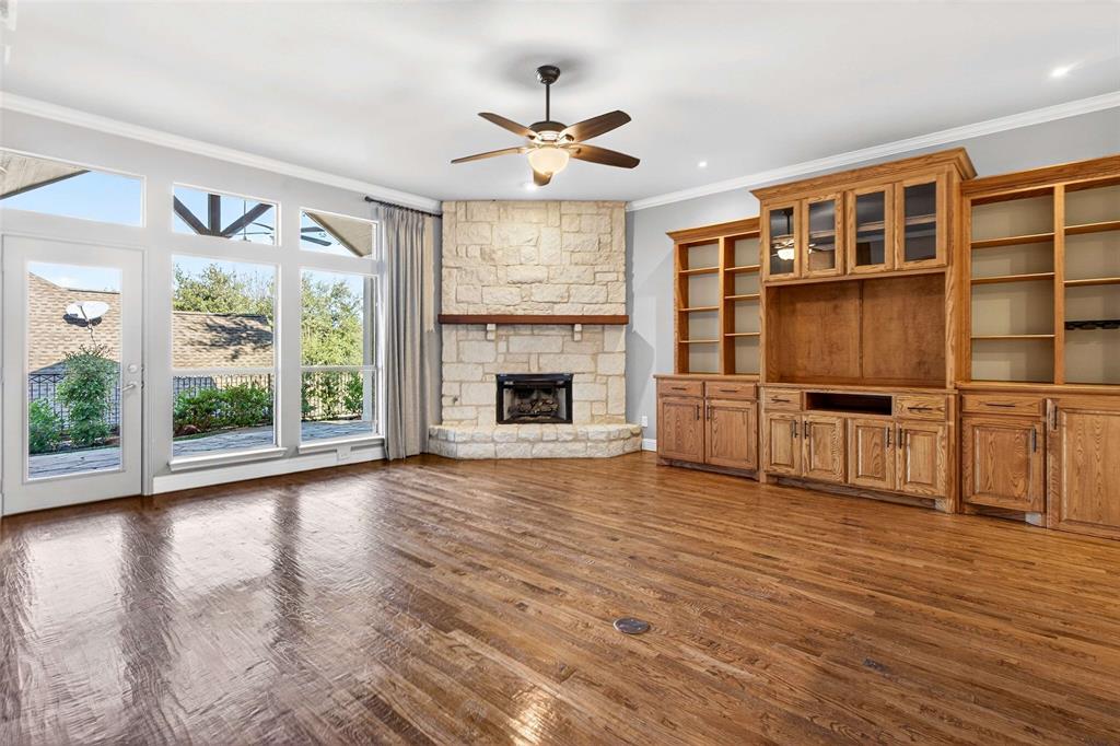 704 Scenic Ranch Circle Fairview, TX 75069 - Photo 8 of 40 a living room with furniture window and wooden floor