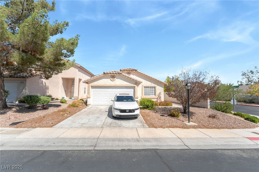 8920 Iron Hitch Avenue Las Vegas, NV 89143 - Photo 5 of 9 front
