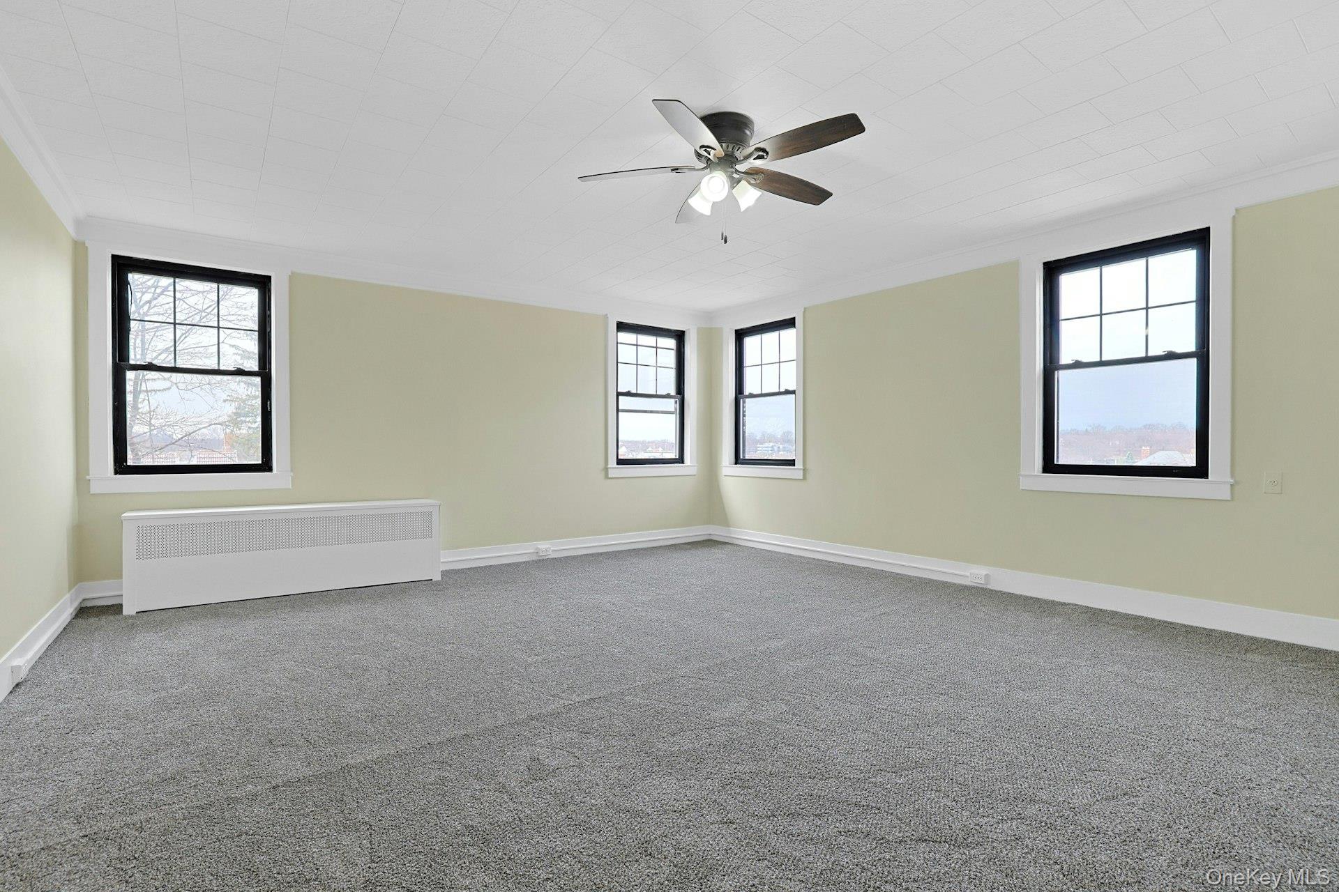 39 Neptune Avenue New Rochelle, NY 10805 - Photo 13 of 28 a view of an empty room with a window