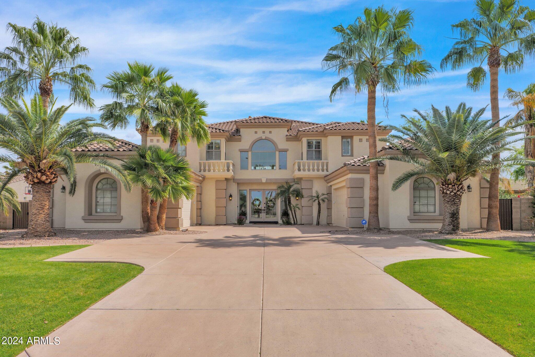 2517 South Constellation Way Gilbert, AZ 85295 - Photo 1 of 105 a front view of multiple houses with yard