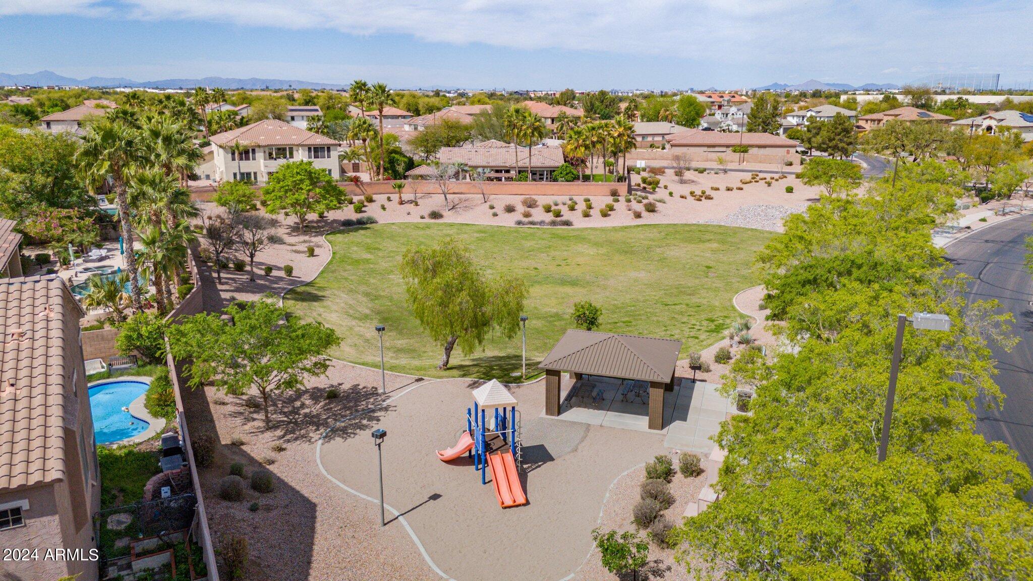 2517 South Constellation Way Gilbert, AZ 85295 - Photo 102 of 105 an aerial view of residential houses with outdoor space and swimming pool
