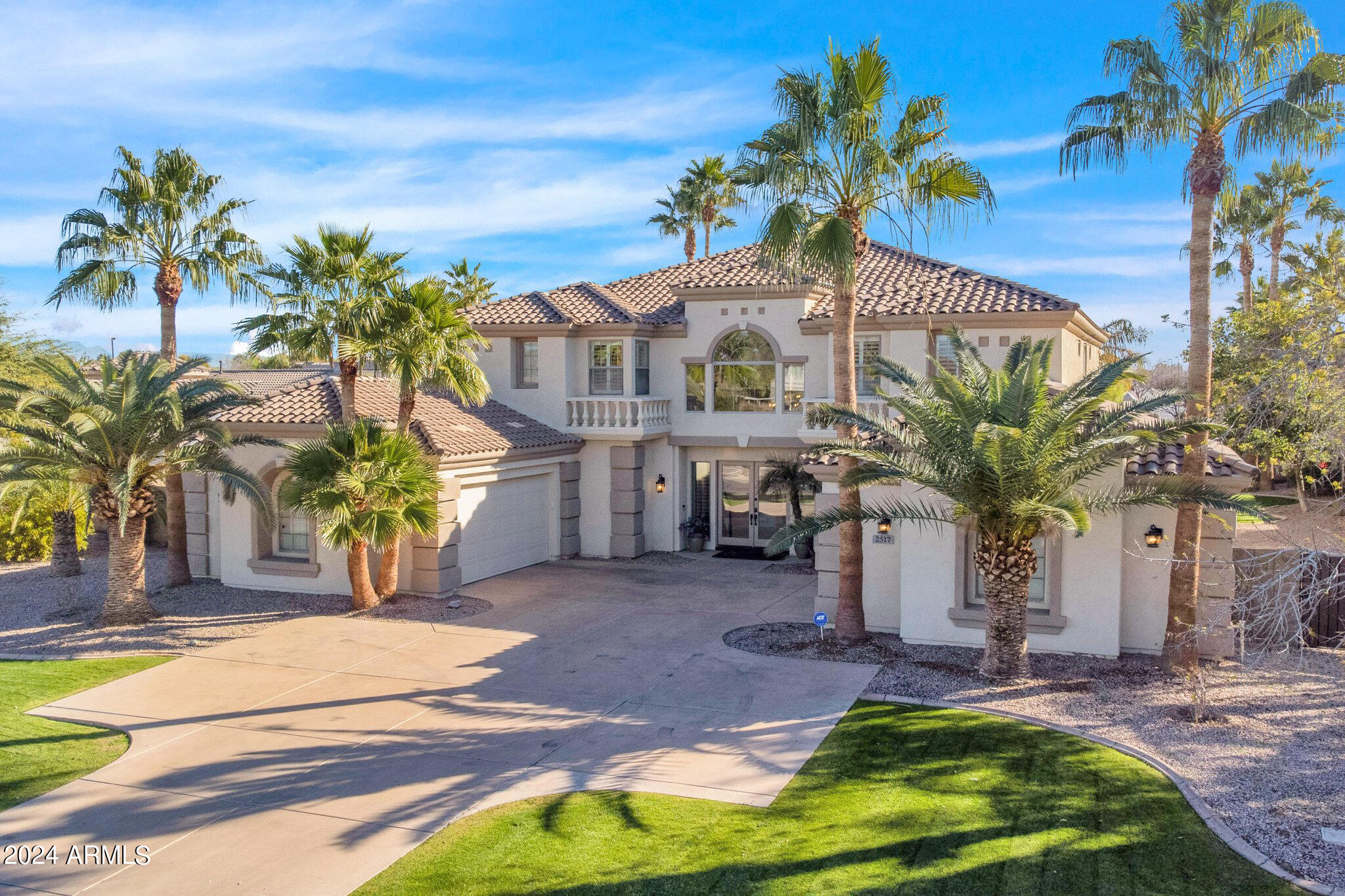 2517 South Constellation Way Gilbert, AZ 85295 - Photo 14 of 105 a front view of a house with a yard