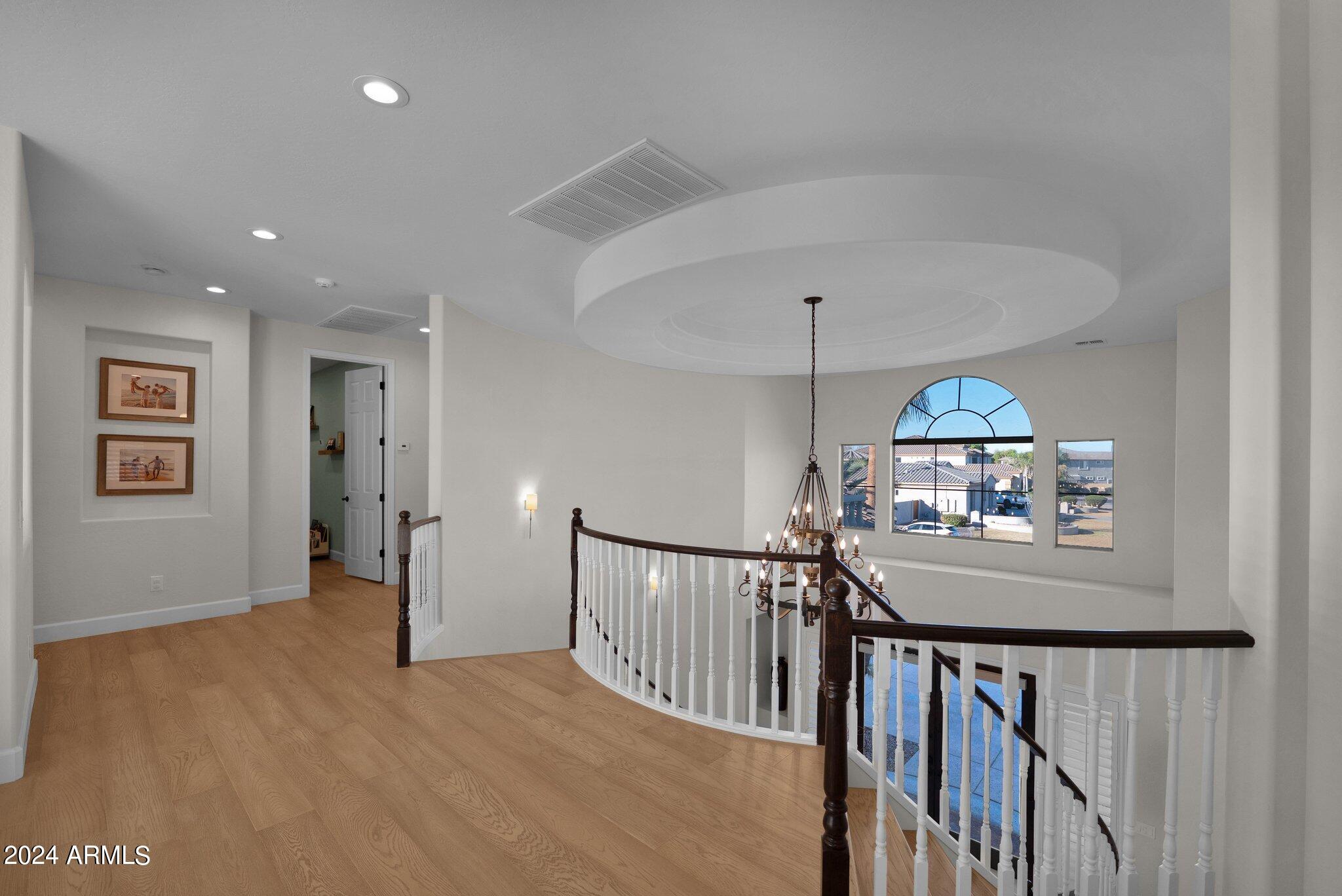 2517 South Constellation Way Gilbert, AZ 85295 - Photo 41 of 105 a view of a hallway with a window and stairs