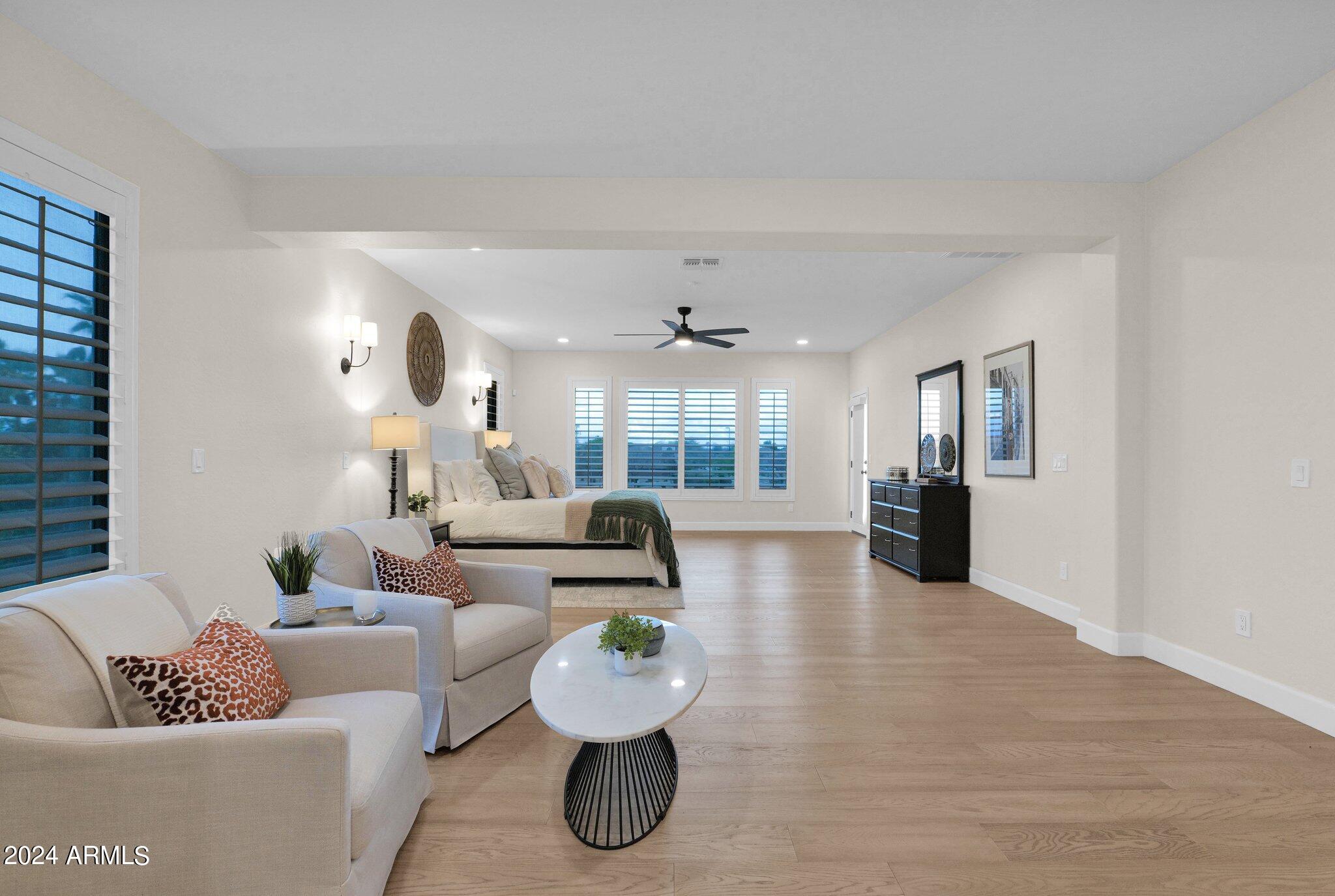 2517 South Constellation Way Gilbert, AZ 85295 - Photo 46 of 105 a living room with furniture and wooden floor