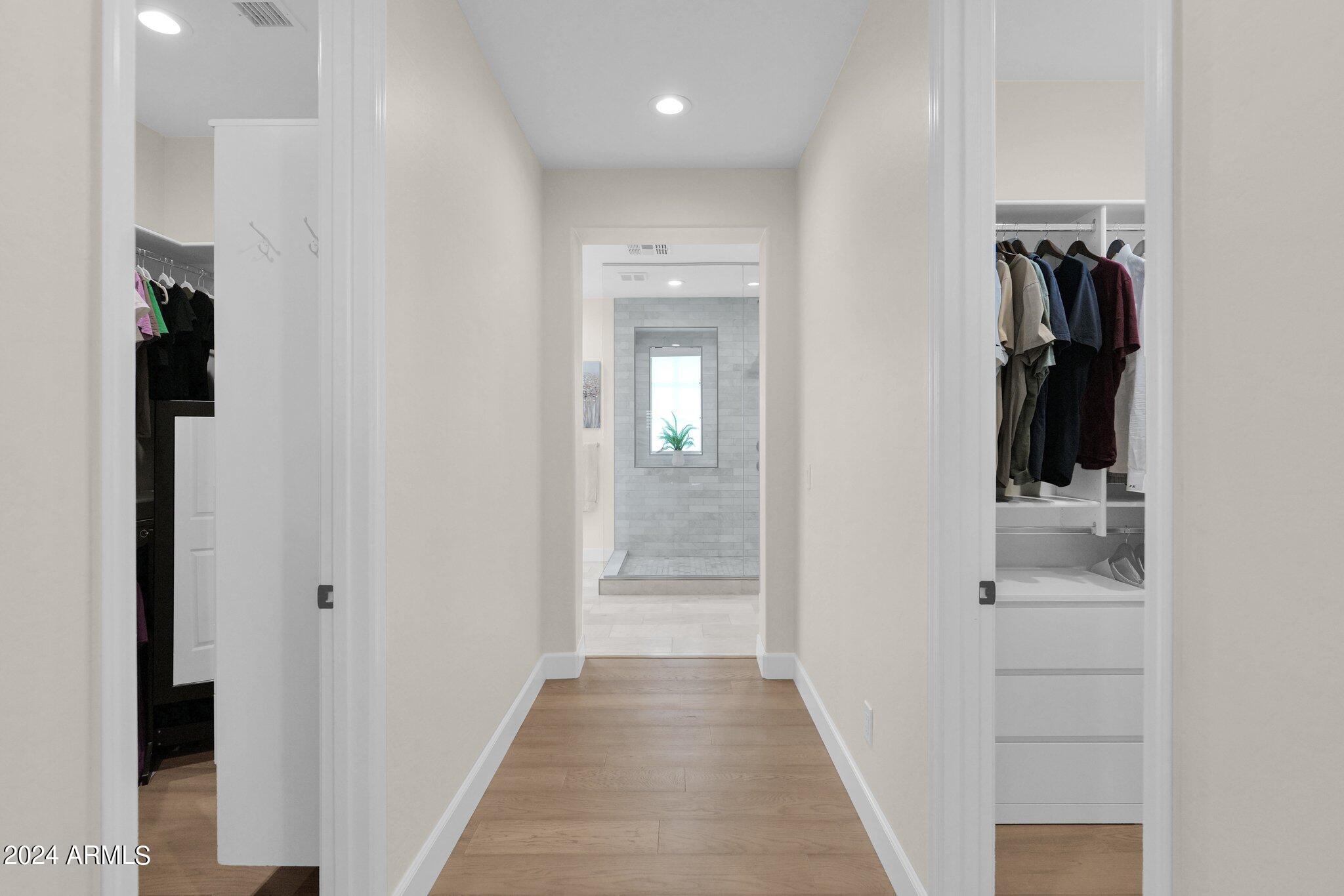 2517 South Constellation Way Gilbert, AZ 85295 - Photo 49 of 105 a view of a hallway with closet and a bathroom