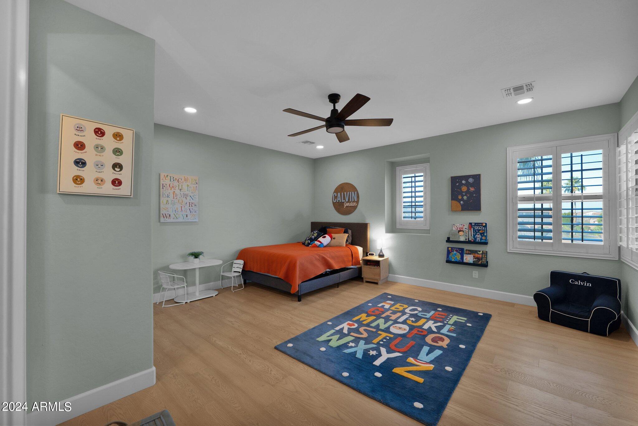 2517 South Constellation Way Gilbert, AZ 85295 - Photo 55 of 105 a bedroom with furniture and a large window