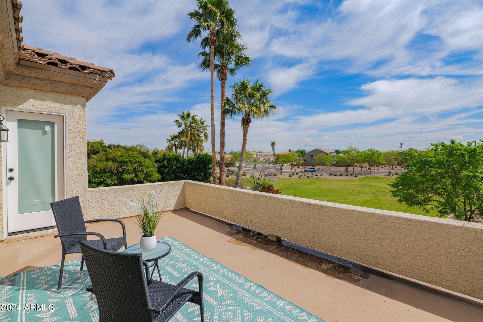 2517 South Constellation Way Gilbert, AZ 85295 - Photo 60 of 105 a view of a chairs and table in the terrace
