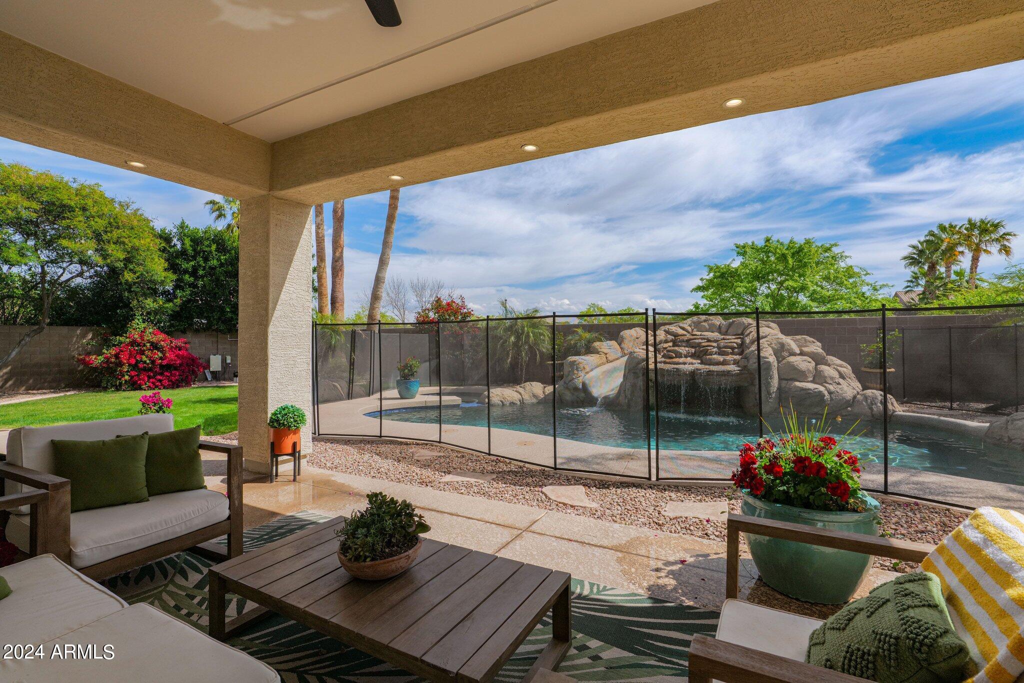 2517 South Constellation Way Gilbert, AZ 85295 - Photo 82 of 105 a view of a chairs and tables in the patio