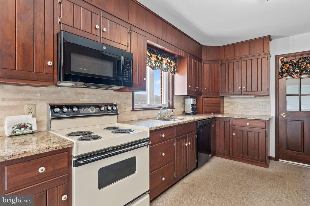 350 Big Spring Road Robesonia, PA 19551 - Photo 16 of 55 Charming kitchen with rich wood accents.