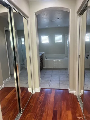 a view of entryway with wooden floor