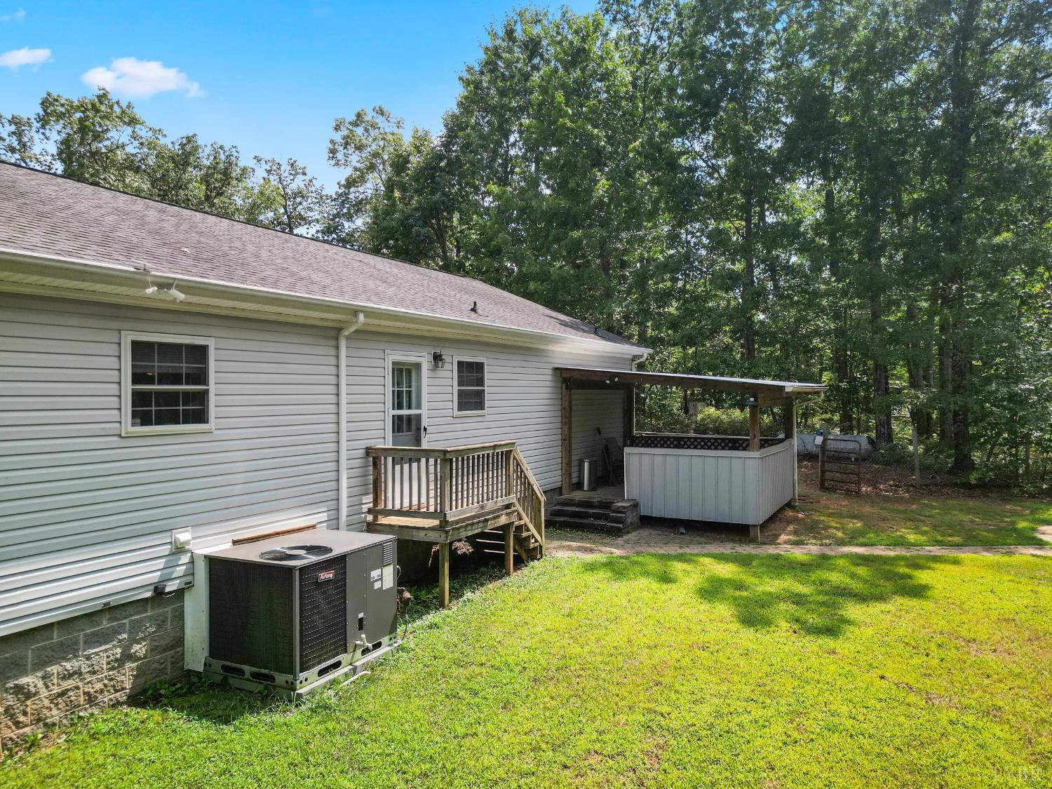 1720 Gallows Road Gretna, VA 24557 - Photo 39 of 73 a view of a house with backyard and sitting area