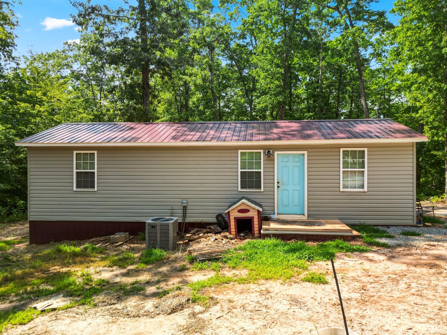 1720 Gallows Road Gretna, VA 24557 - Photo 45 of 73 a view of a house with a yard and chairs