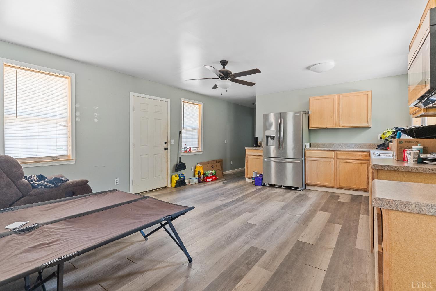 1720 Gallows Road Gretna, VA 24557 - Photo 49 of 73 a living room with stainless steel appliances kitchen island granite countertop furniture and a kitchen view