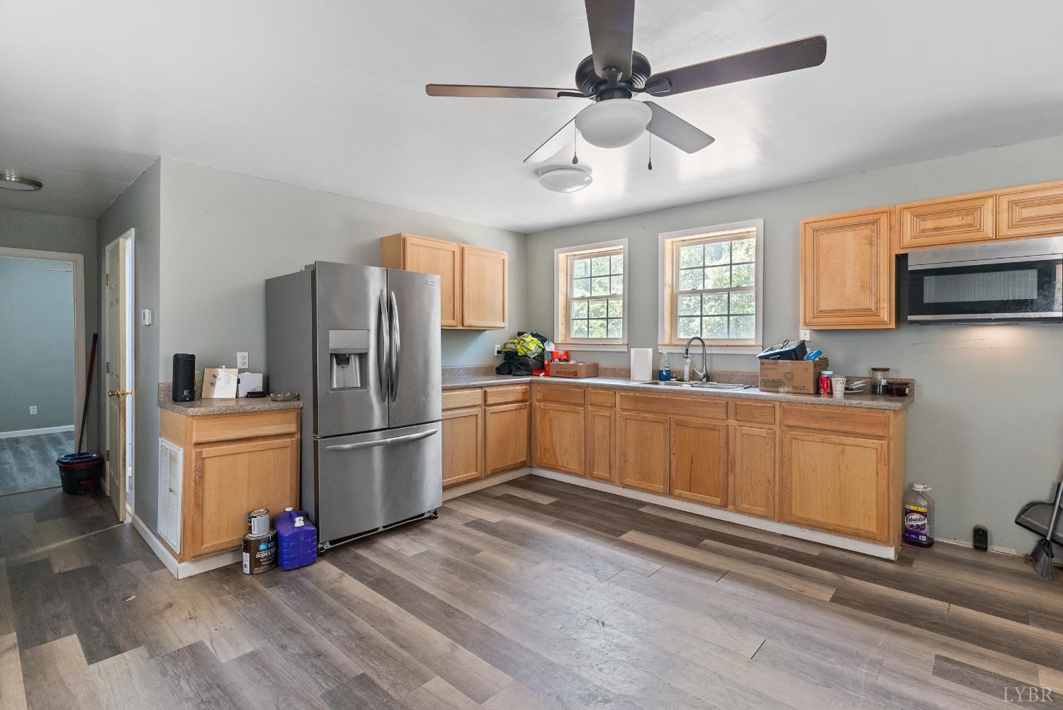 1720 Gallows Road Gretna, VA 24557 - Photo 50 of 73 a kitchen with refrigerator cabinets and wooden floor