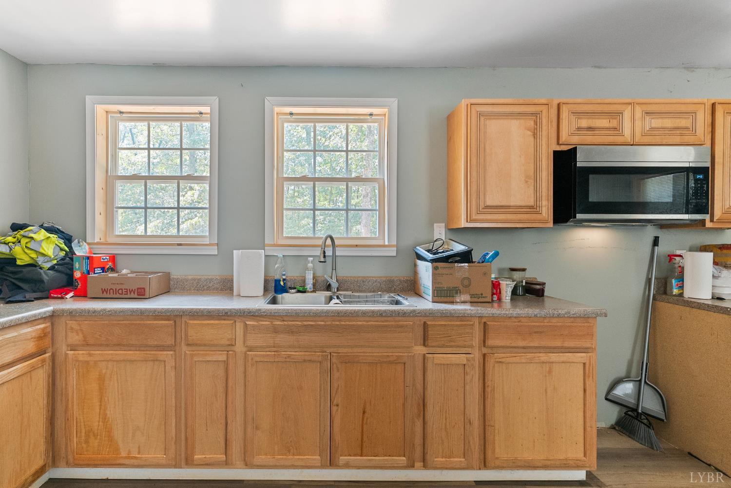 1720 Gallows Road Gretna, VA 24557 - Photo 51 of 73 a kitchen with sink cabinets and window