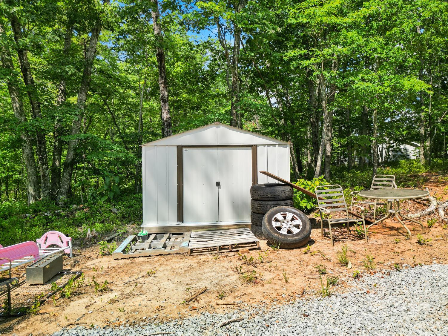 1720 Gallows Road Gretna, VA 24557 - Photo 66 of 73 a front view of a house with garden
