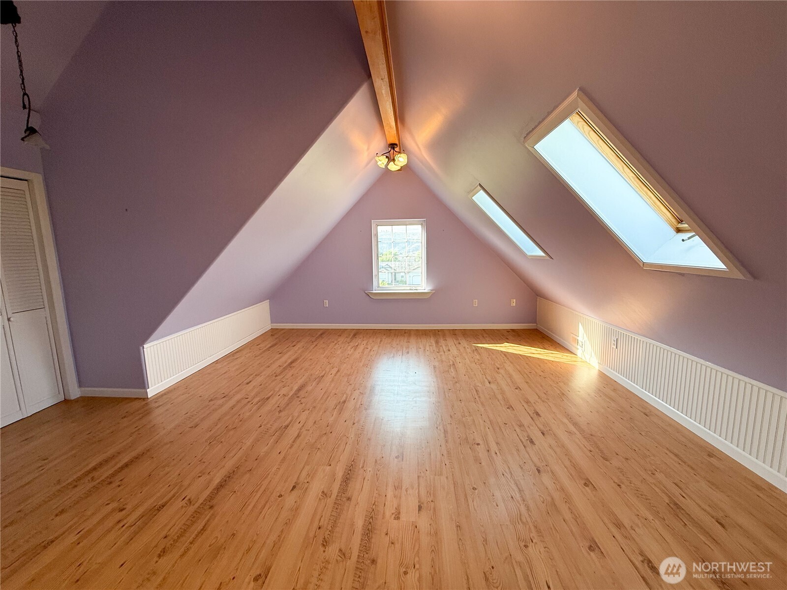 334 Omak River Road Omak, WA 98841 - Photo 23 of 31 a view of a hallway with wooden floor