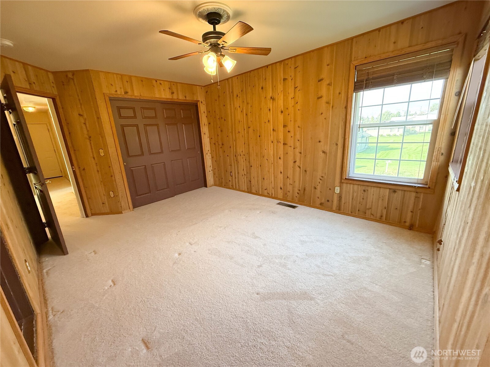 334 Omak River Road Omak, WA 98841 - Photo 27 of 31 a view of an empty room with a window