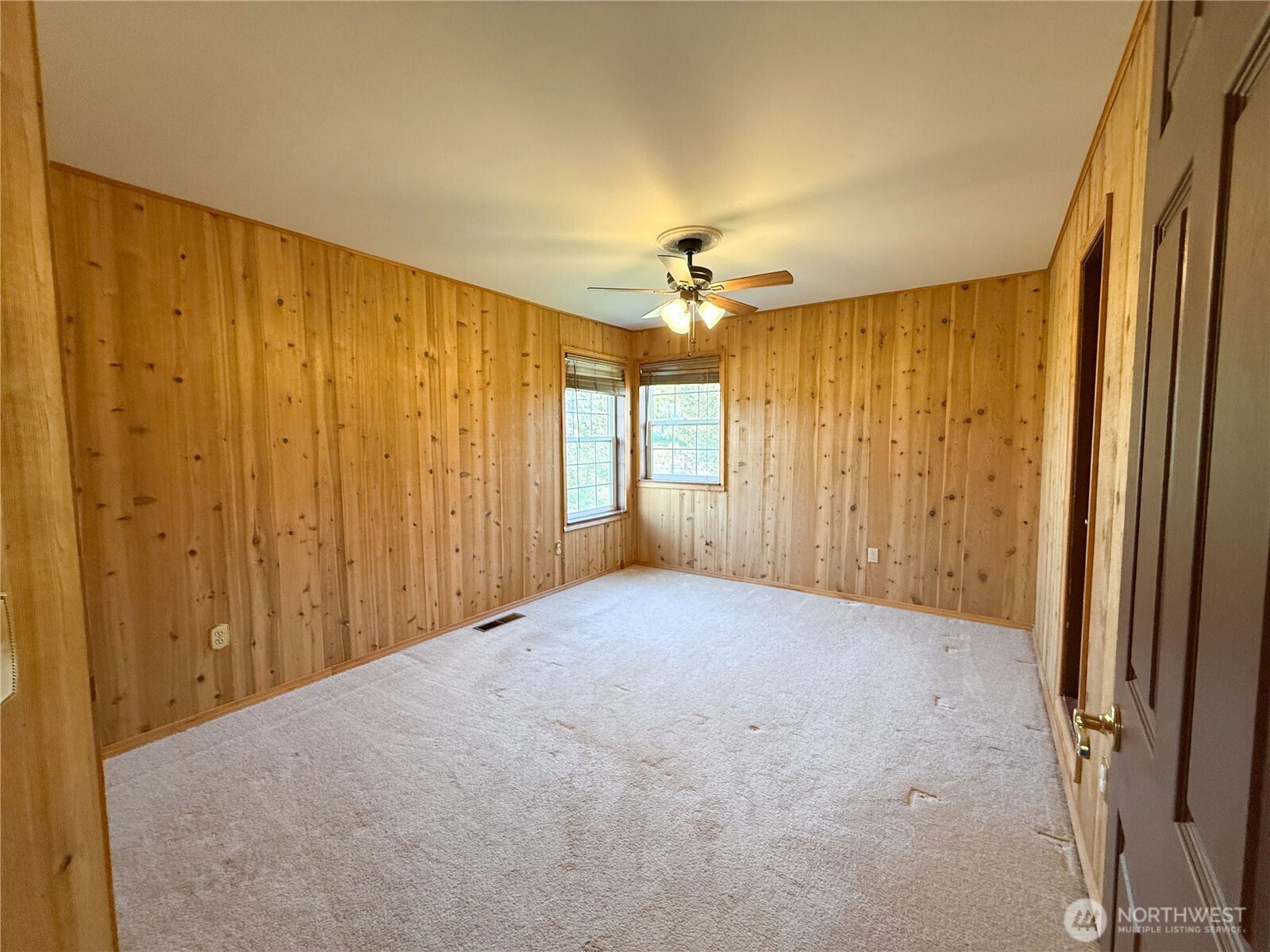 334 Omak River Road Omak, WA 98841 - Photo 28 of 31 an empty room with windows and fan
