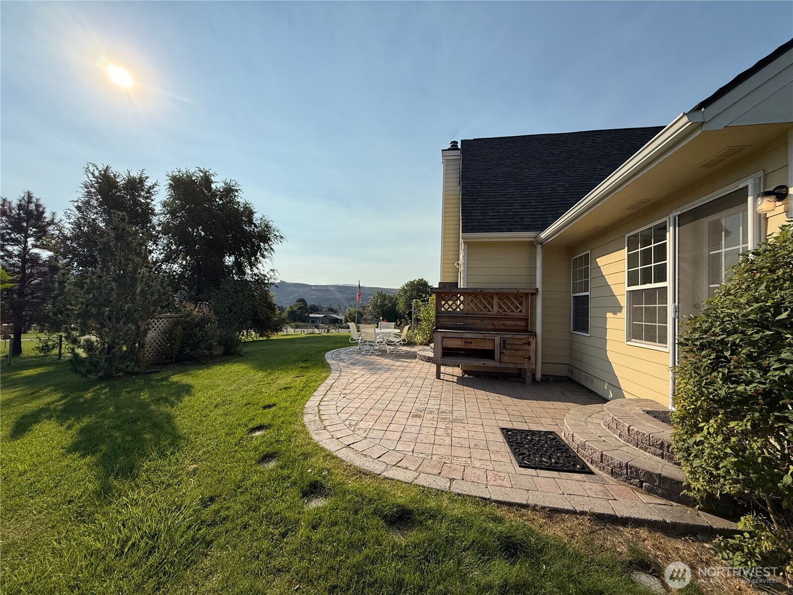 334 Omak River Road Omak, WA 98841 - Photo 4 of 31 a view of a house with backyard