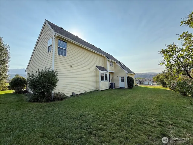 a house view with a garden space