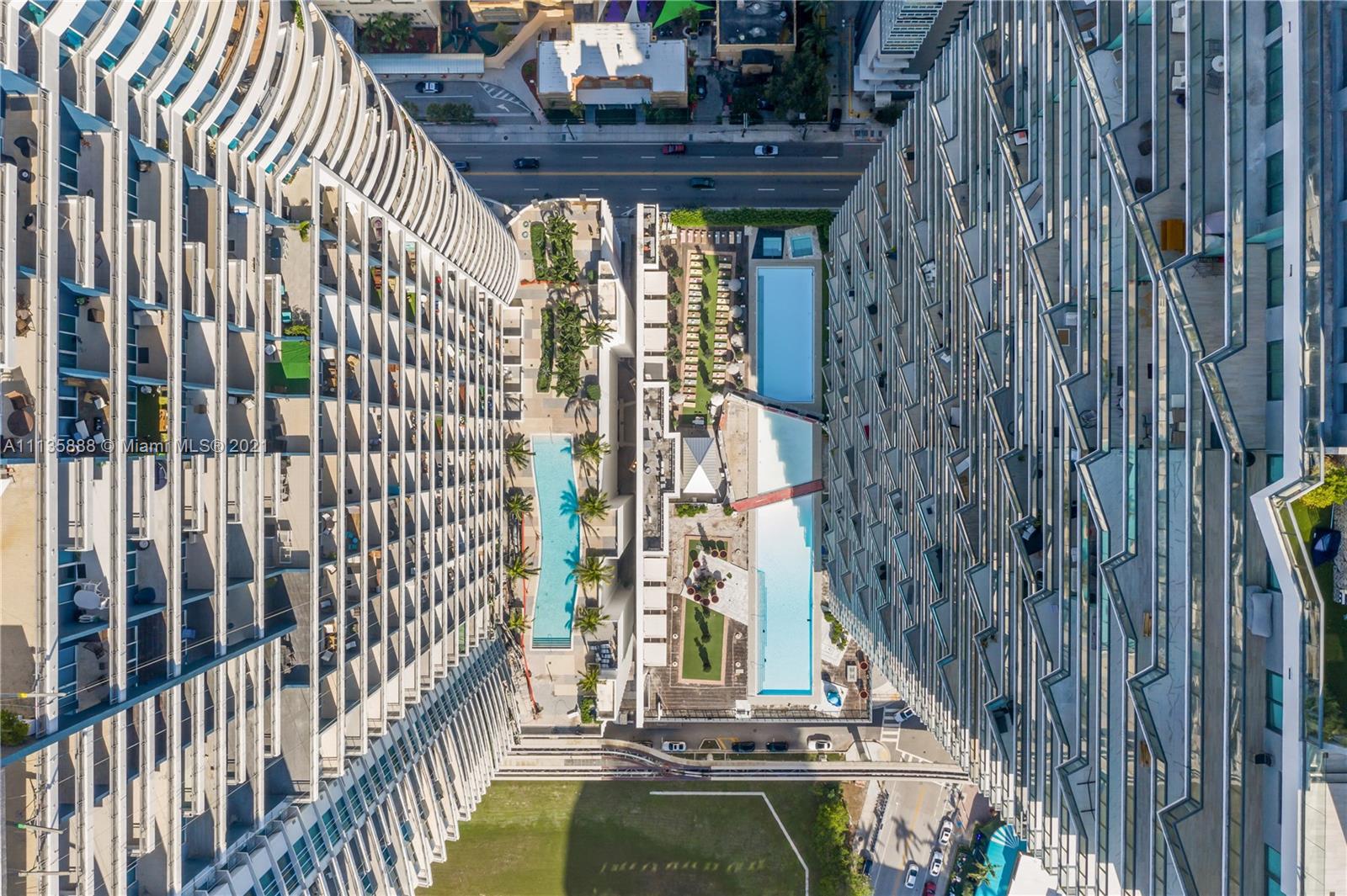 60 Southwest 13th Street, Unit 2204 Miami, FL 33130 - Photo 19 of 25 a view of swimming pool with outdoor seating