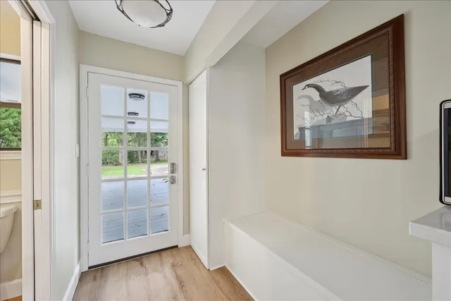 a bathroom with a tub and a shower