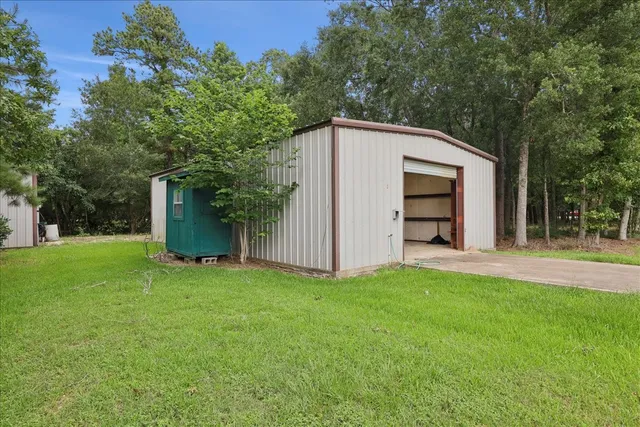 a view of a back yard of the house