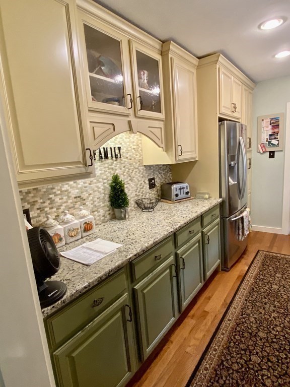 7 McGregory Road Sturbridge, MA 01566 - Photo 11 of 40 a bathroom with a granite countertop sink and a mirror