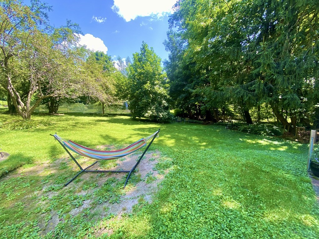 7 McGregory Road Sturbridge, MA 01566 - Photo 3 of 40 a view of a swimming pool with a backyard
