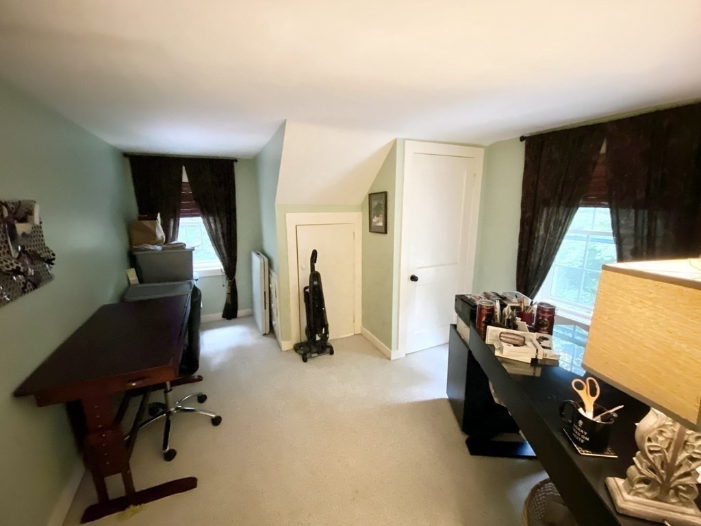 7 McGregory Road Sturbridge, MA 01566 - Photo 31 of 40 a room with furniture and a window