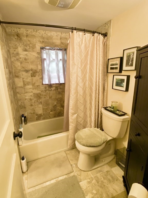 7 McGregory Road Sturbridge, MA 01566 - Photo 32 of 40 a bathroom with a toilet and a shower